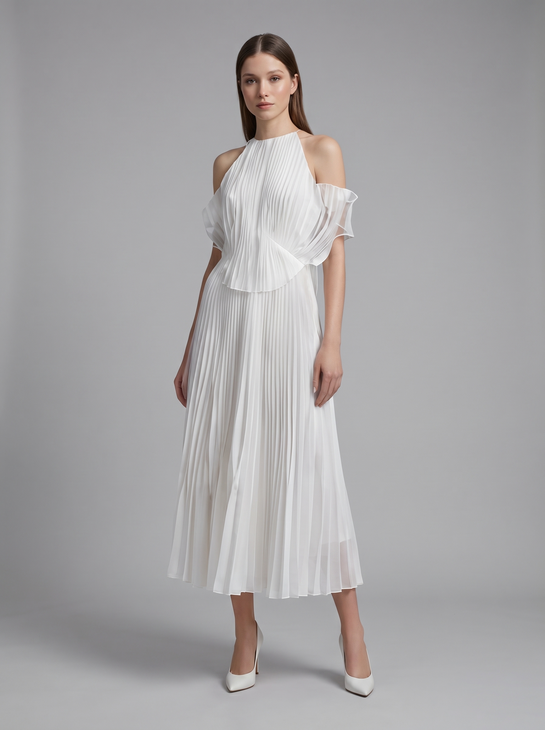 Model in white pleated dress